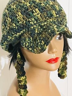 Crochet Camouflage Hat with a brim. Bonus: Free Earrings  Material: 100% Acrylic Yarn Care: machine wash and lay flat to dry  Size: one size fits most  All colors are available Green Military Brimmed Hat, Adjustable Acrylic Outdoor Hats, Green Military Bucket Hat, Green Military Style Bucket Hat, Green Adjustable Military Hat, Adjustable Green Military Hat, Adjustable Acrylic Cap, Handmade Hats With Ear Flaps, One Size, Adjustable Camouflage Military Hat