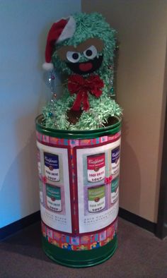 the sesame street cookie jar has been decorated for christmas