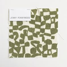 a piece of paper that has been cut in half with the name jenny pennywood on it