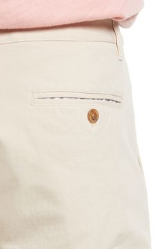 Made from soft four-way-stretch fabric, these slim-tailored chinos feature a curved waistband and a zip pocket for secure storage while you're on the move. 13" leg opening; 10" front rise; 15" back rise Zip fly with button closure Side slant pockets; side zip pocket; back button-welt pockets Moisture-wicking, wrinkle-resistant fabric engineered for dryness and comfort 92% cotton, 8% spandex Machine wash, tumble dry Imported Men's Clothing Beige Chino Cotton Twill Bottoms With Belt Loops, Beige Chino Cotton Twill Bottoms For Business Casual, Beige Chinos For Business Casual With Pockets, Beige Business Casual Chinos With Pockets, Curved Waistband, Oat Milk, Welt Pockets, Welt Pocket, Side Zip