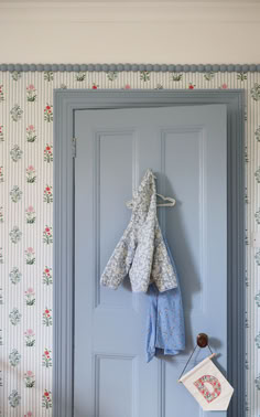 Bobbin blue picture rail used above floral wallpaper in this kids room Bedroom Ideas With Wallpaper Accent Wall, Above Picture Rail Wallpaper, Toddler Blue Room, Laura Stephens Interiors, Nursery With Dado Rail, Wallpaper Picture Rail, Wallpaper And Dado Rail, Kid Room Paint Ideas, Half Wall Papering Ideas Bedroom