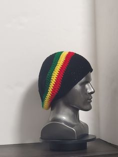 Beret Tam Hat Rasta Hippie Dreads Beanie Reggae Cap Dreadlocks Slouchy One Size This handmade beanie is the perfect addition to any colorful, rastafarian, hip hop, or reggae outfit. The lightweight, stretchy, and breathable material makes it suitable for all seasons, whether you're looking for a winter hat or a summer accessory. The black red yellow and green striped pattern adds a touch of uniqueness to this one size fits all beanie. The slouchy design and acrylic material make it comfortable t Hippie Dreads, Reggae Style, Handmade Beanies, Summer Accessories, Green Stripes, Knit Beanie, Red Yellow, Caps Hats, Accessories Hats