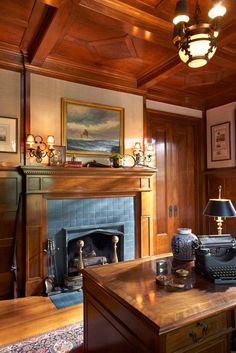 a living room filled with furniture and a fire place