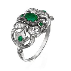 Hand - made 14k gold ring , white gold with 8 diamond and 5 emerald stons. This stunning ring is my last and favorite design . 14k gold ring with emerald and diamonds . Central emerald stone weight : 0.6 carat . Diamond weight : 0.12 carat . Weight ring : 4.2 gram . Top ring length : 2 centimeter . Top ring width : 1.4 centimeter . Silver Emerald Ring With Diamond Accents, Heirloom Emerald Ring With 17 Jewels In Platinum, Art Deco Emerald Rings With Diamond Accents, Platinum Emerald Ring In White Gold, Heirloom Platinum Emerald Ring With 17 Jewels, Art Deco Emerald Ring In White Gold, White Gold Jewelry With Rose Cut Diamonds And Emerald, White Gold Emerald Jewelry With Rose Cut Diamonds, Green Emerald Ring With Diamond Accents In Sterling Silver