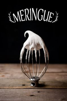 the cover of meringue, with an image of a whisk in it