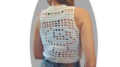 Get ready to turn heads with the unique detailing on the back of our Existence crop top pattern. This boho vintage inspired design is perfect for summer festivals, picnics, or any occasion where you want to show off your free spirit.  The step-by-step instructions and included photos make it easy for you to create your own custom top. Whether you're a seasoned crocheter or just starting out, you'll love the way our pattern comes together.  And with our 100% money-back guarantee, you can shop wit Hippie Crop Top For Summer Festival, Hippie Crop Top For Summer Music Festival, Hippie Sleeveless Crop Top For Music Festival, Hippie Crop Top For Summer, Bohemian Cotton Crop Top For Summer, Bohemian Cotton Crop Top For Music Festival, Hippie Cotton Crop Top For Festivals, Summer Cropped Hippie Tops, Sleeveless Hippie Crop Top For Summer