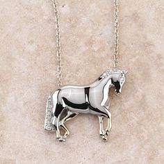 Ashley's 14k white gold Dressage Horse Necklace is hand made and hand finished for superior quality in the USA by Ashley's. Made of solid 14k white gold with .8ct diamonds and 16" diamond cut cable chain. This item is currently OUT of Stock. Please call for delivery schedule. Equine Jewelry, Horse Collection, Horse Art Drawing, Horseshoe Necklace, Equestrian Jewelry, Horse Necklace, Dressage Horses, Horse Jewelry, Horse Head