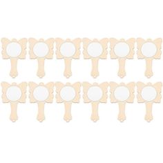 10 pieces of wooden clothes pegs with white circles on each side and one piece in the