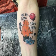 a person with a tattoo on their leg that says we'll float down here