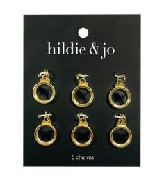 The hildie & jo Printed Icon Charms - Black & Gold will make an interesting addition to your jewelry - making kit This pack includes six gold - tones charms Each of them is designed with a circular clear acrylic shape that sports a silhouette of a bird perched on a branch or a butterfly in a black shade You can use them to create unique earrings, necklaces or bracelets These charms will also make a great gift for a friend who likes making jewelry and loves natureBrand: hildie & joIncludes six ch Black Metal Jewelry With Logo Charm, Gold Hoop Earrings With Black Enamel For Gift, Elegant Black Enamel Clip-on Earrings As Gift, Elegant Black Enamel Clip-on Earrings For Gift, Vintage Gold Clip-on Earrings With Black Enamel, Acrylic Shapes, Jewelry Making Kit, Black Shade, Jewelry Making Charms