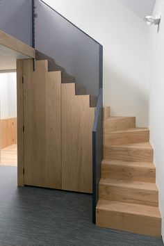 the stairs are made of wood and metal