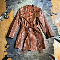 "Vintage 70s boho cognac brown leather trench by duette fashions made in usa sz s/m giving mod french girl  measurements  shoulder to shoulder 16\" sleeve length 24\" bust 38\" waist 26\"-30\" lenght 33\"" 70s Boho, French Girl, Vintage 70s, Cognac, Brown Leather, Jackets & Coats, Jackets For Women, Sleeve Length, Bathing Beauties