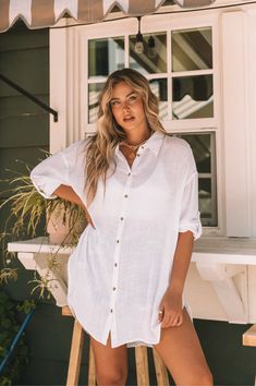 ~ 55% Linen, 45% Viscose ~ Oversized tunic length ~ Long sleeve button up ~ Curved U-shape hem ~ High-low length ~ Can wear as a long sleeve or as a 3/4 sleeve ~ Model is 5'9" wearing a size Medium Vacation Button-up Shirt With Button Cuffs, Casual Shirt Dress With Button Cuffs And Shirttail Hem, Oversized Button-up Shirt Dress For Beach, Oversized Vacation Blouse With Button Closure, White Shirt Dress For Beach In Fall, White Button Closure Shirt Dress For Beach, Oversized Blouse For Vacation With Button Closure, Oversized Blouse With Button Closure For Vacation, Summer Long Sleeve Relaxed Fit Shirt Dress