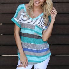 If you love our comfy and fashionable tees then you'll adore our Backyard BBQ Pocket Top! SO SIMPLE AND ADORABLE, this relaxed fit top features a v-neckline, a small pocket, short sleeves and is the perfect go-to piece! So soft and comfortable, you'll want to wear it all the time! The Backyard BBQ Pocket Top is available in three stylish colors; Red, Pink and Blue.US Size Chart Summer V-neck Top With Pockets, V-neck Tops With Pockets For Vacation, V-neck Top With Pockets For Day Out, Casual V-neck T-shirt For Vacation, Casual V-neck Tops With Side Pockets, Relaxed Blue V-neck Top, Relaxed Fit V-neck T-shirt For Vacation, Vacation V-neck Relaxed Fit T-shirt, Trendy V-neck Top With Pockets