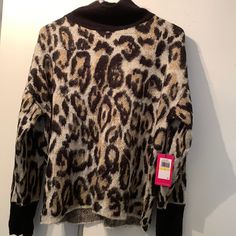 Wool Sweater New With Tag. Leopard Print. Trendy Leopard Print Winter Sweater, Casual Leopard Print Long Sleeve Sweater, Winter Leopard Print Long Sleeve Sweater, Long Sleeve Leopard Print Winter Sweater, Turtleneck Tunic Sweater, Cheetah Cardigan, Work Sweaters, Black Poncho, Cowl Neck Long Sleeve