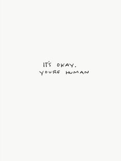 the words it's okay, you're human written in black ink