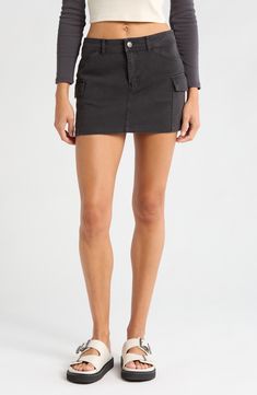 Cargo pockets lend on-trend utility vibes to this weekend-ready miniskirt made from sturdy cotton twill. 13" center front length (size Medium) Zip fly with button closure Front slant pockets; back patch pockets; cargo flap-patch pockets Unlined 100% cotton Machine wash, line dry Imported Cotton Workwear Skirt With Multiple Pockets, Cotton Work Skirt With Multiple Pockets, Utility Mini Skort With Pockets, Utility Cotton Mini Skirt With Patch Pockets, Utility Cotton Cargo Skirt, Utility Cotton Skirt With Patch Pockets, Cotton Cargo Skirt With Patch Pockets For Work, Cotton Utility Skirt With Patch Pockets, Cotton Skirt With Patch Pockets For Fall