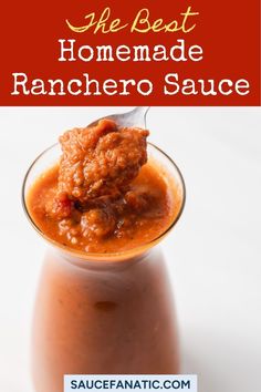 the best homemade ranchero sauce is in a glass with a spoon full of it