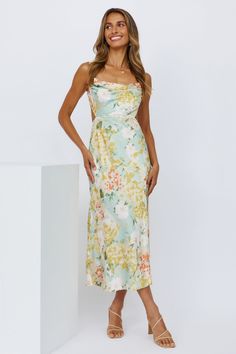 Length from shoulder to hem of size S: 103cm. Floral midi dress. Lined. Cold hand wash only. Model is a standard S and is wearing S. True to size. Lightweight, woven satin fabric. Invisible back zipper. Polyester. With this cute AF satin midi, you'll be hypnotizing everyone in the room. Get ready to hear about everyone's desires. The Showing Up Satin Midi Dress has a lovely open back, with a straight neckline and boning at the torso. Style yours with strappy heels and gold adornments. Yellow Midi Dress, Dress Yellow, On My Own, Satin Midi Dress, Floral Midi Dress, Strappy Heels, Satin Fabric, Designer Dresses, Strapless Dress