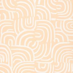 an orange and white wallpaper with wavy lines