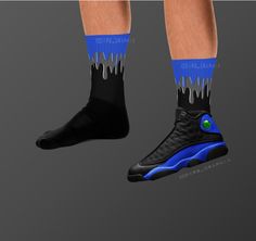 These Jordan 13 Retro 'Hyper Royal' inspired all-over-print socks are extra comfortable thanks to their cushioned bottom. The foot is black with artwork printed along the leg with crisp, bold colors that won't fade.  * 60% nylon/22% cotton/18% spandex * Crew length * Cushioned bottom * Ribbed leg * Cold wash with like colors and hang dry * A great year-round gift idea with graphics inspired by the Jordan 13 Retro 'Hyper Royal' colorway! * Perfect gift for any sneakerhead! * The Jordan 13 Retro ' Blue Non-slip Sporty Socks, Sporty Non-slip Blue Socks, Blue Non-slip Casual Socks, Casual Blue Non-slip Socks, Casual Blue Socks For Sports Events, Blue Sports Socks, Black Non-slip Socks For Sports, Black Non-slip Socks For Sports Events, Casual Black Socks For Sports Events