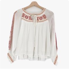 Nwt Altar’d State White Cropped Embroidered Blouse Size Small Lined 100% Rayon White Embroidered Sleeve Summer Tops, White Long Sleeve Peasant Top With Embroidered Hem, White Embroidered Top For Fall, Embroidered Long Sleeve Blouse For Brunch, Long Sleeve Embroidered Blouse For Brunch, Folk Style White Embroidered Top For Fall, Folk Style Embroidered White Top For Fall, White Long Sleeve Blouse With Embroidered Hem, Summer Long Sleeve Peasant Top With Geometric Embroidery