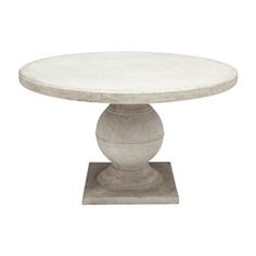 a white marble table on a pedestal with an oval base and two small round bases