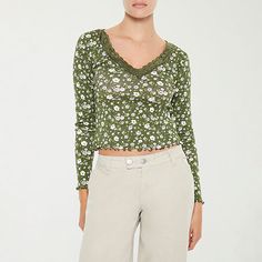 You'll love this Forever 21 women's and junior's long-sleeve t-shirt for its delicate lace trim and ribbed floral-print finish. This fitted pullover tee is made from 100% cotton and comes complete with a v-neckline and lettuce trims for a feminine touch. Wear it with jeans.Closure Type: Pullover HeadFit: FittedNeckline: V NeckSleeve Length: Long SleeveSleeve Style: Fitted SleeveFiber Content: 100% CottonCare: Dry Flat, Hand WashMaterial: CottonCountry of Origin: Imported Cheap Forever 21 Cotton Blouse, Fitted Lace Top T-shirt For Spring, Spring Crew Neck T-shirt With Lace Top, Spring T-shirt With Lace Trim And Crew Neck, Casual T-shirt With Lace Trim For Spring, Trendy Long Sleeve Lace Top, Casual Stretch Tops With Lace Trim, Spring Cotton Tops With Lace Trim, Crew Neck Cotton Top With Lace Trim