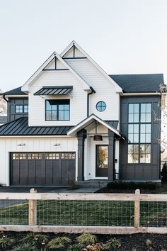 the instagram page on instagram shows an image of a house with black and white trim