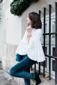 Emilie The Brunette wearing our Antonina white shirt for a winter style. Chic Bell Sleeve Blouse For Day Out, Chic Bell Sleeve Tops For Day Out, White Shirt Blouse, Paris Mode, White Shirt Dress, Shirt Collection, Shirts Blouses, White Shirts, Spring Summer Outfits