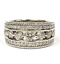 an image of three wedding rings with diamonds on top and the band in white gold