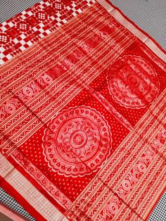 Passapalli white and red Sambalpuri silk saree. Highest quality silk saree handweaved. Comes with a blouse piece White Tussar Silk Saree With Woven Motifs, White Tussar Silk Dupatta With Woven Motifs, White Saree With Woven Motifs In Traditional Drape, White Saree With Woven Motifs, White Saree With Woven Motifs For Festivals, Festive White Saree With Woven Motifs, White Bandhani Print Traditional Wear For Festivals, White Saree With Woven Motifs For Traditional Ceremonies, White Bandhani Traditional Wear For Festivals