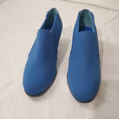 New In Box Woman's Size 7.5m Color Blue Stylish Blue Slip On With A 2 Inch Kitten Heel. Box C Blue Court Shoes With Medium Width And Round Toe, Light Blue Pointed Toe Heels In Synthetic, Blue Platform Boots With Pointed Toe, Light Blue Pointed Toe Synthetic Heels, Light Blue Pointed Toe Heels, Blue Closed Toe Court Shoes With Padded Heel, Blue Padded Heel Court Shoes, Blue Pointed Toe Court Shoes With Sculpted Heel, Blue Pointed Toe Court Shoes For Office