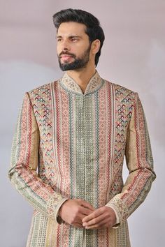 Beige, multi colored printed sherwani highlighted with kasheeda embroidery. Comes with solid kurta and salwar. - Aza Fashions Multicolor Embroidered Bandhgala For Eid, Multicolor Embroidered Bandhgala Straight Kurta For Eid, Multicolor Embroidered Straight Bandhgala For Eid, Eid Bandhgala With Multicolor Embroidery In Straight Kurta Style, Festive Bandhgala With Multicolor Embroidery, Festive Multicolor Nehru Jacket For Designer Wear, Multicolor Straight Kurta Nehru Jacket For Festivals, Multicolor Designer Nehru Jacket For Eid, Multicolor Nehru Jacket Straight Kurta For Festivals