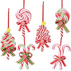 christmas candy lollipops hanging from red and green ribbons