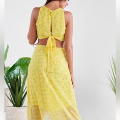 Yellow Floral Two Piece Set Top Has Tie Back Yellow Tie Back Maxi Dress For Summer, Yellow Maxi Dress With Lemon Print For Spring, Yellow Flowy Maxi Dress For Daytime, Flowy Yellow Maxi Dress For Daytime, Yellow Lemon Print Maxi Dress For Spring, Mustard Beach Maxi Dress For Spring, Mustard Maxi Dress For Beach In Spring, Mustard Maxi Dress For Spring Beach Occasion, Mustard Maxi Dress For Beach And Spring