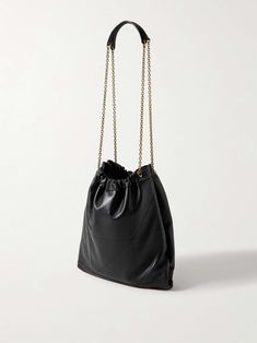 Find SAINT LAURENT Jamie 4.3 Embellished Quilted Leather Shoulder Bag on Editorialist. SAINT LAURENT's 'Jamie' bag has seen many iterations since its introduction by Creative Director Anthony Vaccarello in 2018 - each one as chic and timeless as the last. This '4. 3' version is crafted from supple leather that's quilted using the maison's signature 'Carré Rive Gauche' topstitching and embellished with a gold-tone 'YSL' logo plaque to match the adjustable chain straps. Stow your laptop, make-up pouch and spare flats inside. Ysl Logo, Anthony Vaccarello, Rive Gauche, The Saint, Makeup Pouch, Quilted Leather, Chain Bags, Green Bag, White Bag