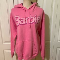 Junk Food Barbie Logo Graphic Hoodie Retail $59.00 From Junk Food, This Hoodie Features: Attached Hood And Drawstring Long Sleeves Front Barbie Logo Graphic Front Kangaroo Pocket Pullover Styling Cotton Machine Wash/Tumble Dry Pink Crew Neck Top With Kangaroo Pocket, Pink Long Sleeve Top With Kangaroo Pocket, Pink Crew Neck Hoodie With Kangaroo Pocket, Pink Sweatshirt With Kangaroo Pocket For Fall, Pink Fall Sweatshirt With Kangaroo Pocket, Pink Fall Hoodie With Kangaroo Pocket, Pink Trendy Sweatshirt With Kangaroo Pocket, Casual Pink Hoodie With Kangaroo Pocket, Pink Hooded Top With Kangaroo Pocket