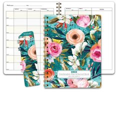 a planner with flowers on it and a notepad attached to the cover, sitting next to an empty notebook