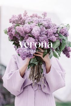 a woman holding a bunch of flowers over her face with the words, veronia above her head