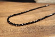 This necklace features shiny and beautiful black spinel faceted rondelles. The stones are strung on high quality beading wire and the necklace closes with a lobster clasp. You can choose a rose gold, sterling silver or gold filled clasp. People have compared black spinel to black diamonds because of their gorgeous shine! black spinel- 5mm (approx.) Please select what length you would like the necklace to be made and if you would like a rose gold, gold filled or sterling silver clasp. You can cho Black Rondelle Spacer Beads Jewelry, Black Rondelle Gemstone Beaded Necklace, Black Rondelle Gemstone Bead Necklace, Black Rondelle Beaded Jewelry, Black Rondelle Beads Jewelry, Black Faceted Round Beaded Necklaces, Black Faceted Beaded Necklaces, Black Rondelle Gemstone Beaded Jewelry, Black Rondelle Gemstone Beads Jewelry