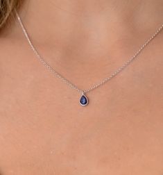 This dainty Sapphire pendant necklace has a delicate silver chain. The chain is solid sterling silver 925., and there is an extension so that the size can be adjusted. There are different stonees to choose from. The stones are natural stones and no 2 are identical, but they are similar. If you would like a custom order or have any questions please contact me, thanks. Blue Sterling Silver Charm Necklace With Adjustable Chain, Sterling Silver Teardrop Charm Necklace With Delicate Chain, Delicate Sterling Silver Drop Necklaces, Sterling Silver Teardrop Pendant Charm Necklace With Delicate Chain, Sterling Silver Drop Necklace In Delicate Style, Delicate Tiny Sterling Silver Necklace, Sterling Silver Charm Necklace With Teardrop Pendant, Delicate Sterling Silver Birthstone Necklace With Delicate Chain, Tiny Delicate Sterling Silver Necklace