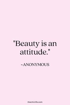 the quote beauty is an attitude anonymous on pink background with black and white lettering, which reads