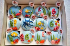 cupcakes in a box decorated with sea animals