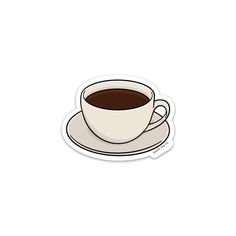 a cup of coffee on a saucer sticker is shown in the shape of a mug