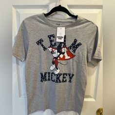 Team Mickey Disney T-Shirt Boys Large New With Tags. Character Cotton T-shirt With Crew Neck, Disney Character Print Cotton T-shirt, Cotton Character Print Tops, Character Crew Neck Cotton Top, Mickey Mouse Graphic Tee Tops, Character Style Cotton Short Sleeve Tops, Mickey Mouse Themed Cotton Top, Themed Mickey Mouse Cotton Top, Cotton Character T-shirt With Crew Neck