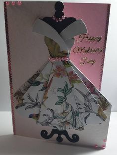 a mother's day card with a dress on it