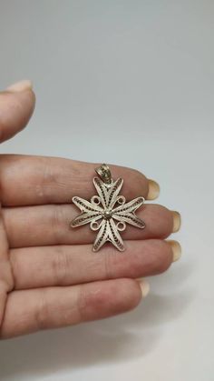 Vintage filigree Maltese cross hallmarked 925 for sterling silver with time patina Weight 2.47g Size 26x35mm All of our pieces are in pre-loved, vintage or antique condition, with signs of age and wear preserved as a mark of authenticity. Antique Nickel-free Cross Pendant Jewelry, Vintage White Cross Jewelry, Ornate Handmade Cross Jewelry, Ornate Hallmarked Cross Jewelry, Antique Silver Cross Pendant Jewelry, Antique Cross Pendant Jewelry With Intricate Design, Ornate Sterling Silver Cross Jewelry, Ornate Engraved Cross Pendant Jewelry, Victorian Cross Jewelry As Gift