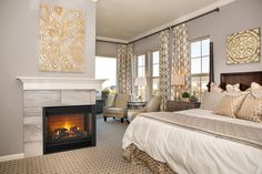 a bedroom with a fire place in the fireplace