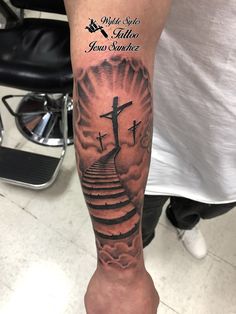 a person with a cross on their arm